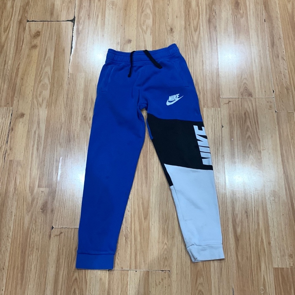 Nike joggers in black, white, and blue Medium for boys in kids